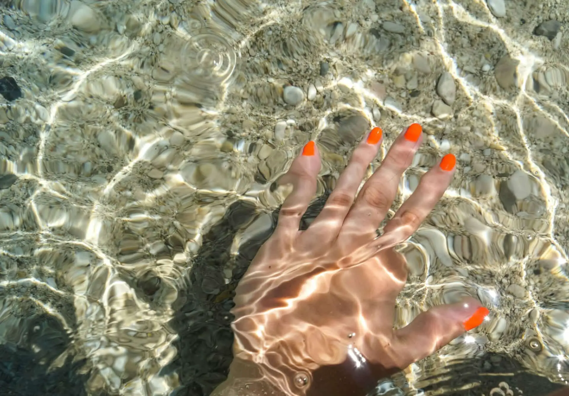 swim with acrylic nails