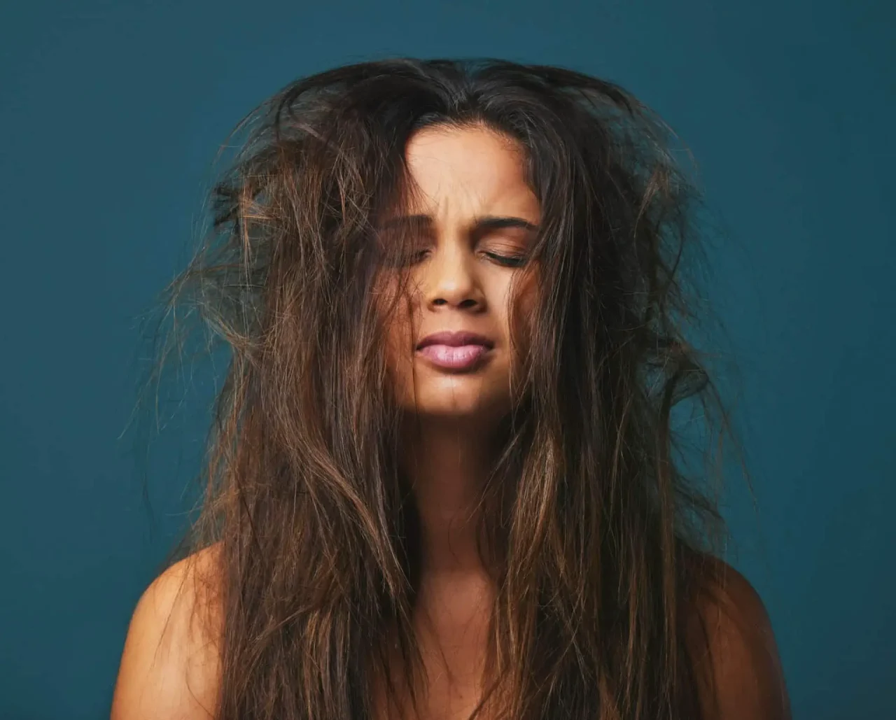 How to get rid of the frizz on top of your head