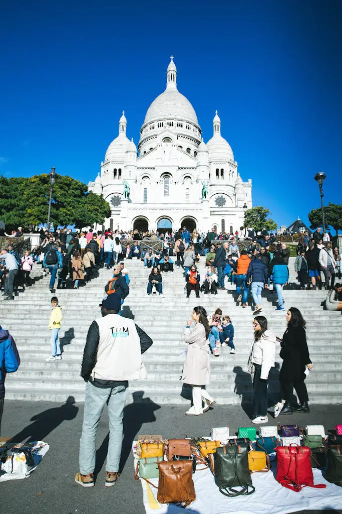 People on Steps in front of Basilica of the Sacred Heart of Montmartre in Paris